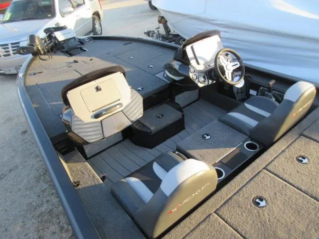 Slide: The Image of 2024 Vexus AVX1880 boat interior with Mercury 115 ProXS engine, featuring modern seating and controls. - 9