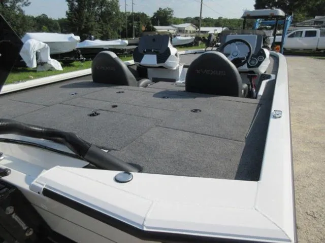 Slide: The Image of 2025 Vexus AVX 2080 boat with Mercury Pro XS engine, featuring spacious seating and modern design. - 11