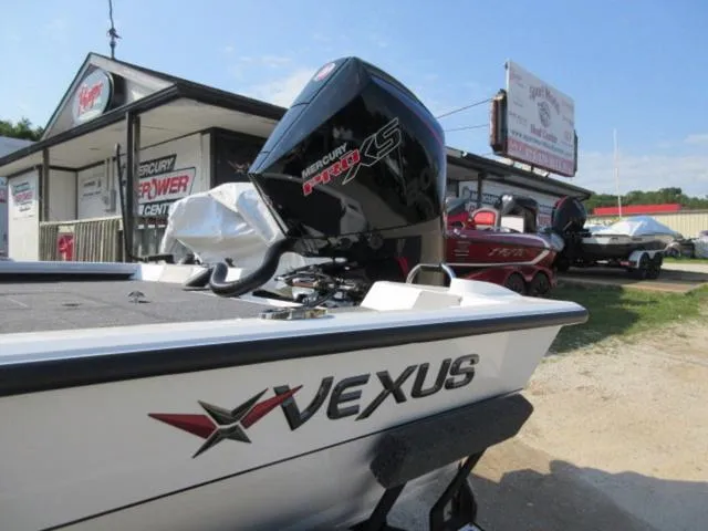 Slide: The Image of 2025 Vexus AVX 2080 boat with 200 Mercury Pro XS engine at dealership. - 3