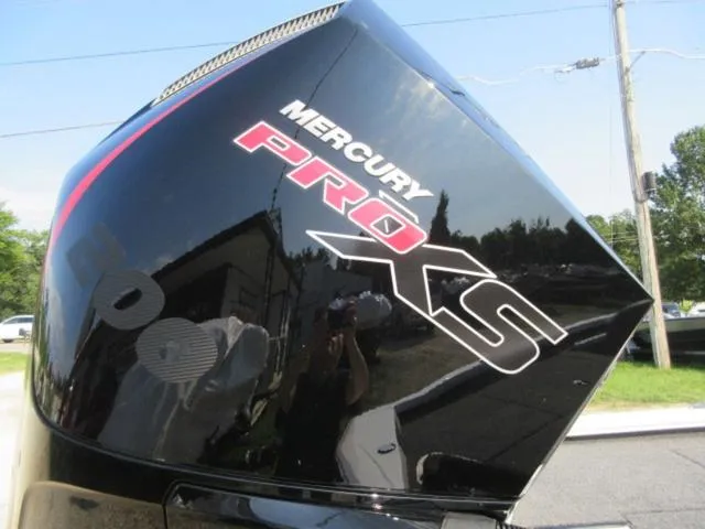 Slide: The Image of 2025 Vexus AVX 2080 with Mercury Pro XS engine, sleek black design. - 6