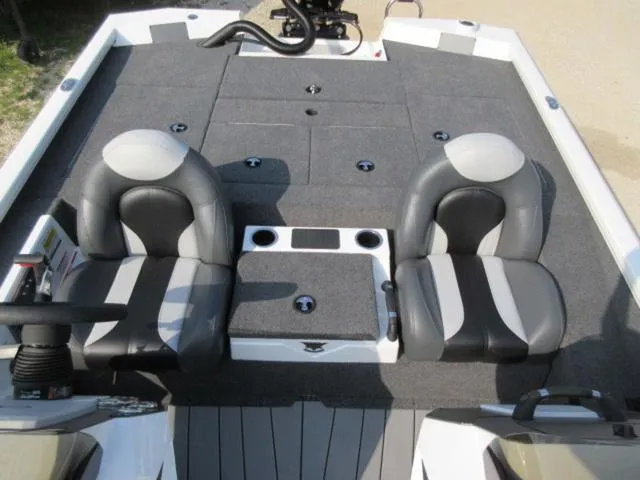 Slide: The Image of 2025 Vexus AVX 2080 boat interior with dual seats and storage compartments. - 9