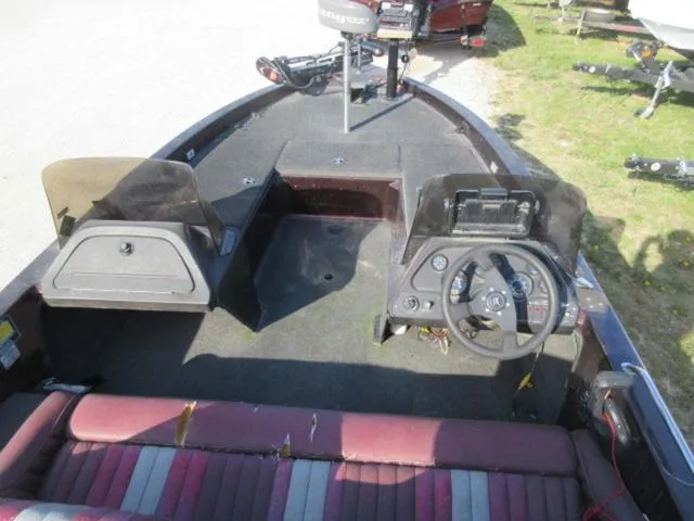 Slide: The Image of 1995 Ranger 392XT boat interior with Marner 200 Hp outboard and Ranger trailer. - 8