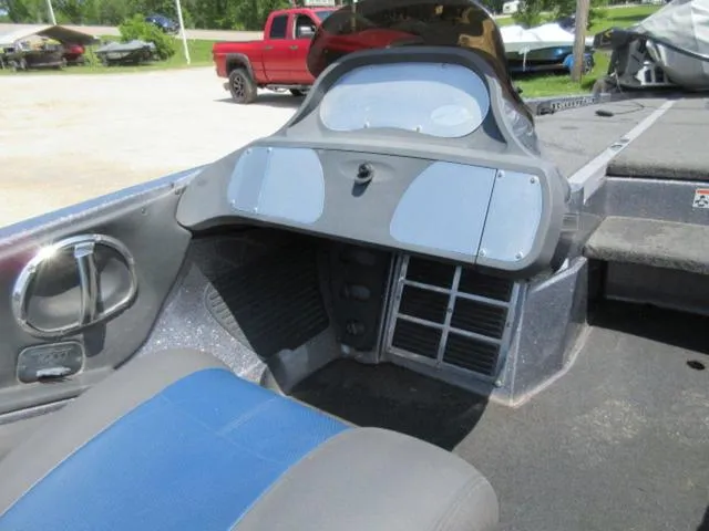 Slide: The Image of 2007 Ranger Z20 boat interior with Mercury 225 Optimax, featuring dashboard and seating area. - 12