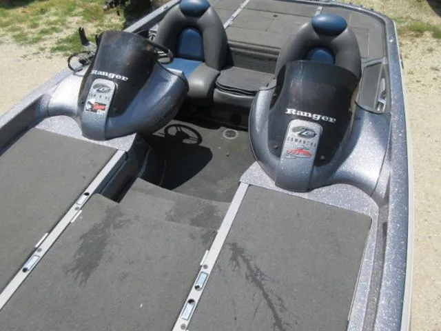 Slide: The Image of 2007 Ranger Z20 boat interior with dual consoles and seating. - 18
