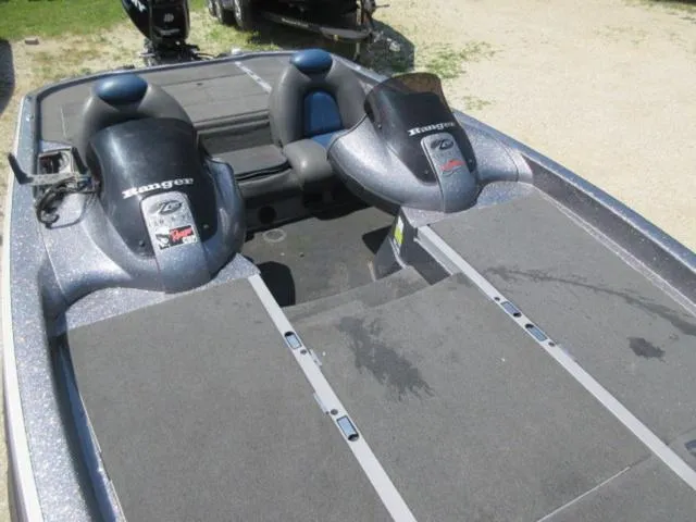 Slide: The Image of 2007 Ranger Z20 boat with Mercury 225 Optimax engine, featuring dual seats and spacious deck. - 19