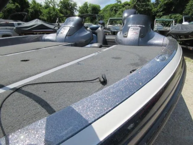 Slide: The Image of 2007 Ranger Z20 boat with Mercury 225 Optimax engine, parked outdoors. - 20
