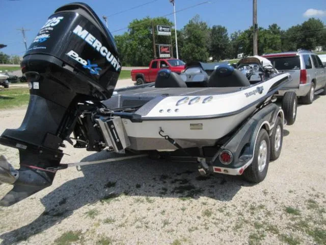 Slide: The Image of 2007 Ranger Z20 boat with Mercury 225 Optimax engine on a trailer. - 21