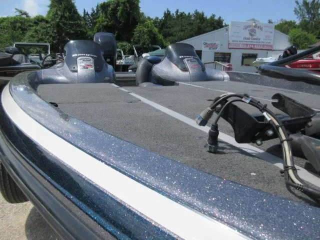 Slide: The Image of 2007 Ranger Z20 boat with Mercury 225 Optimax engines, parked outdoors. - 22