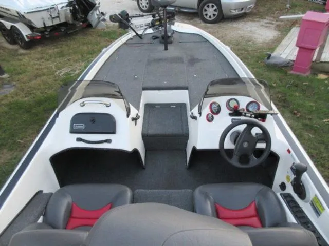 Slide: The Image of 2004 Champion 187 bass boat with Mercury 175Hp outboard, clean interior, dual seats. - 13