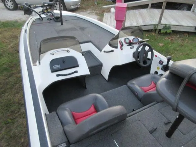 Slide: The Image of 2004 Champion 187 bass boat with Mercury 175Hp outboard, clean interior, dual seats. - 20