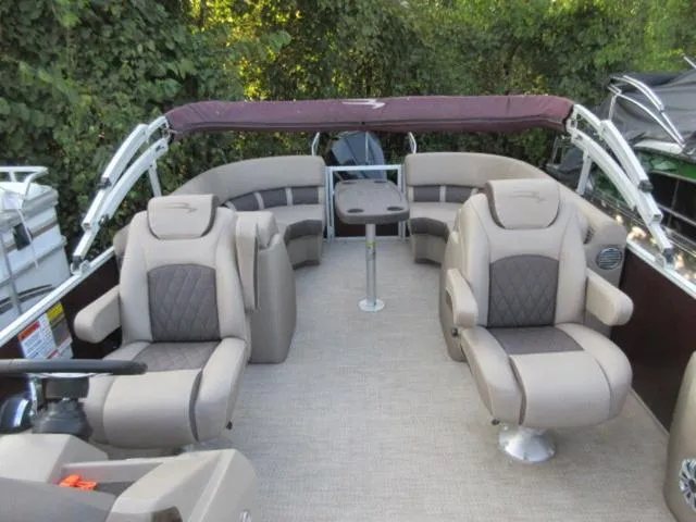 Slide: The Image of Luxurious 2019 Bennington SX 23 Premier Tritoon with plush seating and canopy. - 6