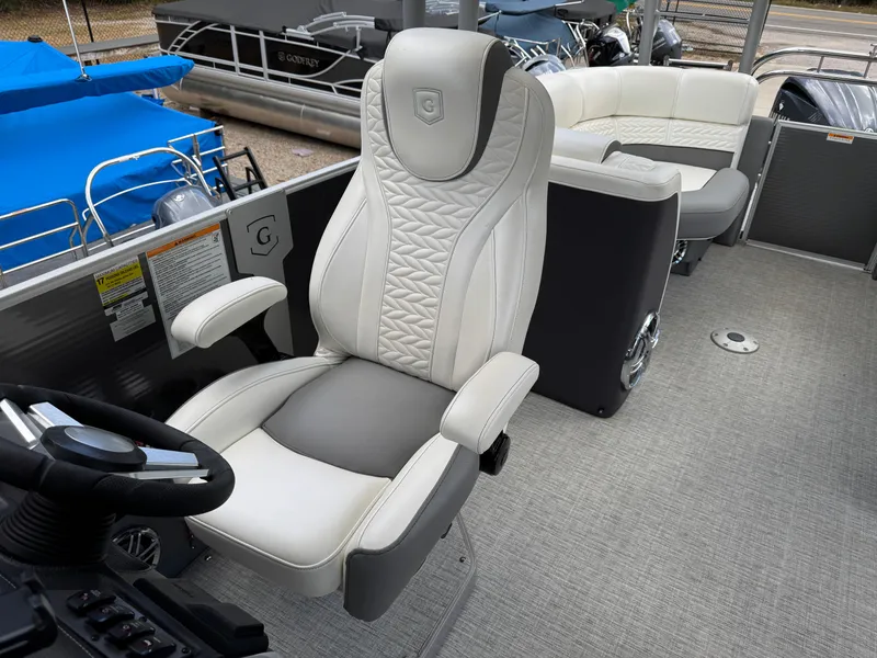 Slide: The Image of Luxurious seating on 2023 Godfrey Monaco 255 SD pontoon boat, featuring elegant design and comfort. - 15