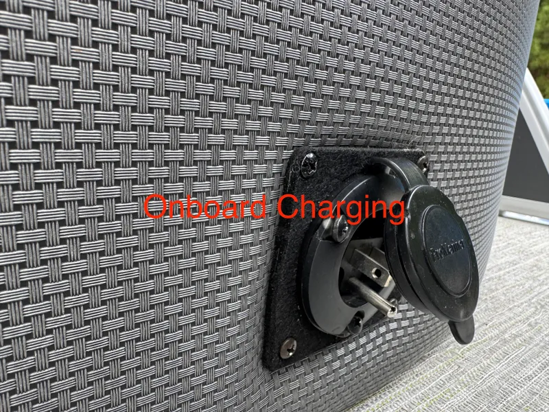 Slide: The Image of Onboard charging port on 2023 Godfrey Monaco 255 SD boat. - 25