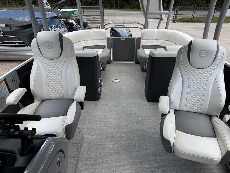 Slide: The Image of 2023 Godfrey Monaco 255 SD boat interior with luxurious seating and modern design. - 28