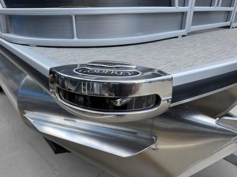 Slide: The Image of 2023 Godfrey Monaco 255 SD boat with sleek metallic finish and modern design. - 31