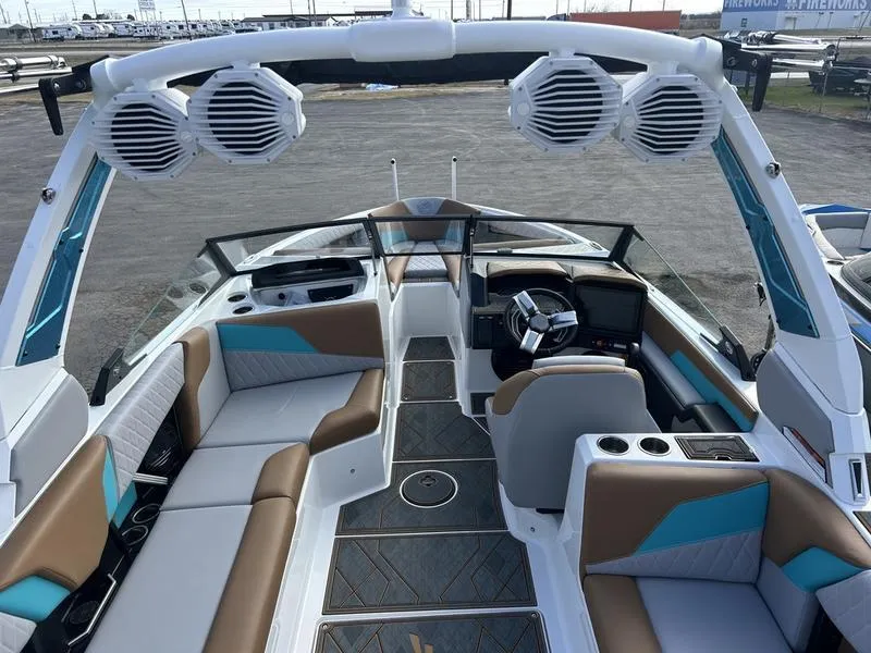 Slide: The Image of 2025 Tigé Z3 boat interior with modern seating and advanced audio system. - 5