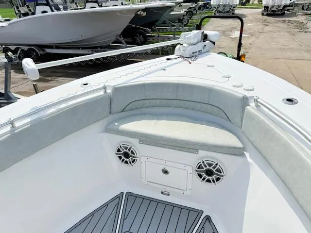 Slide: The Image of 2019 Sportsman Open 282TE Center Console boat interior with seating and speakers. - 3