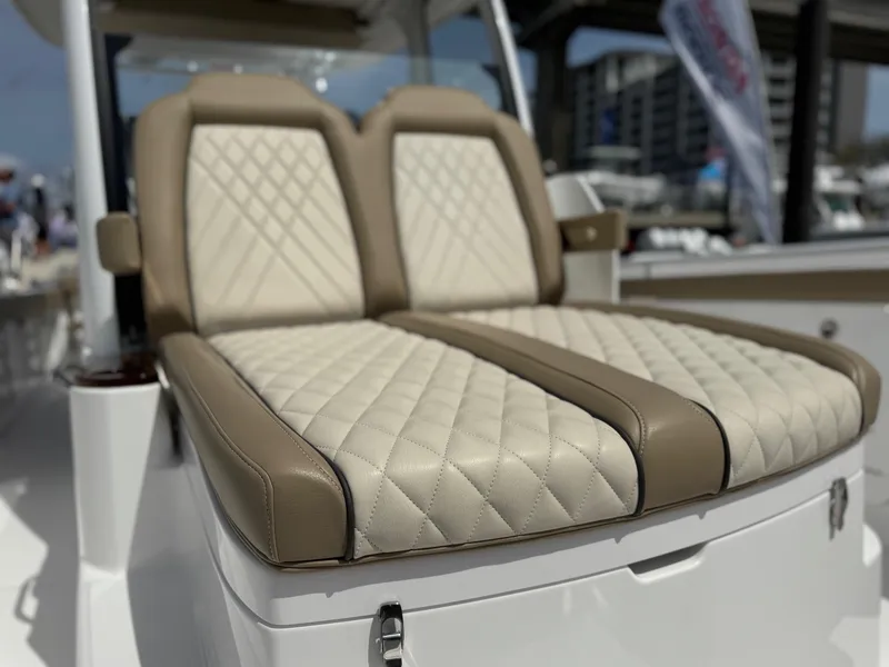 Slide: The Image of 2024 Everglades 315CC boat seats with diamond-stitched upholstery, showcasing luxury and comfort. - 35