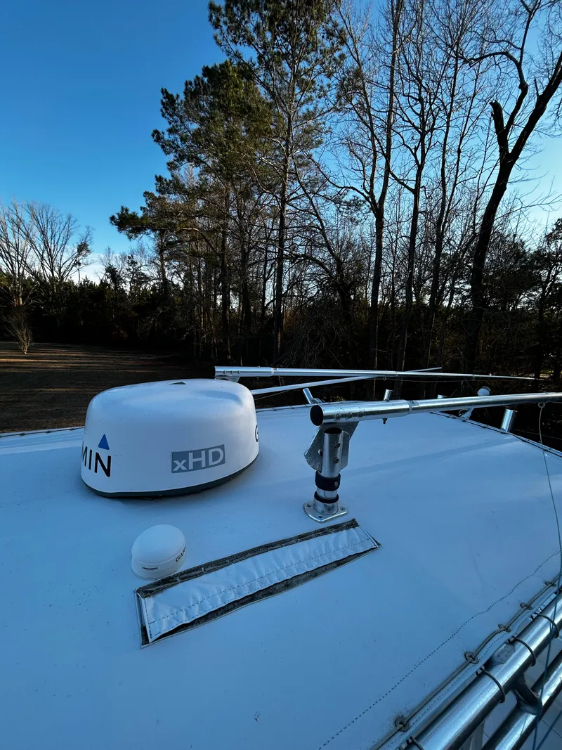 Slide: The Image of Rooftop view of 2015 Contender 25 Tournament boat with radar and antenna equipment. - 33