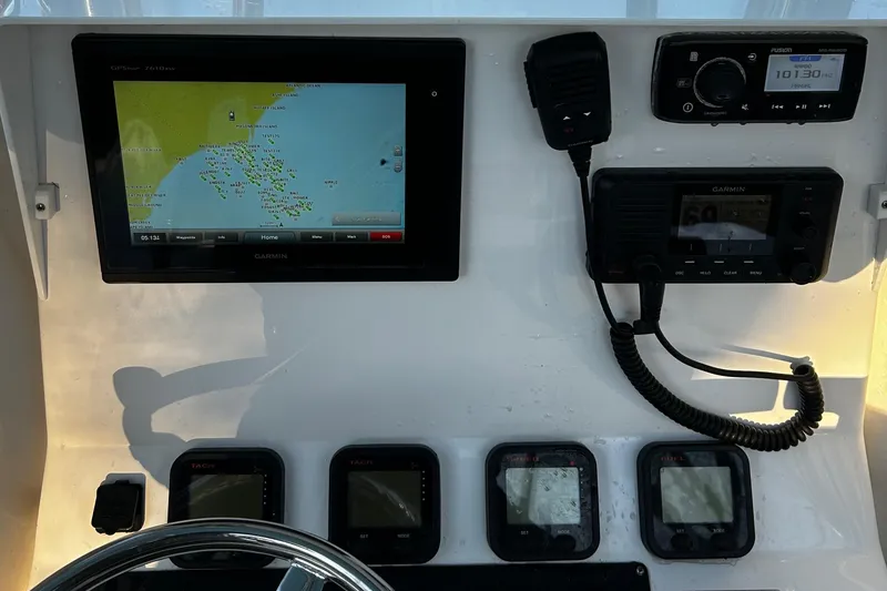 Slide: The Image of Control panel of 2015 Contender 25 Tournament boat with navigation and communication equipment. - 36