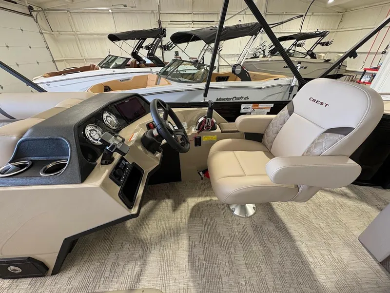 Slide: The Image of Luxurious interior of 2025 Crest Classic 220 boat with plush seating and modern design. - 15