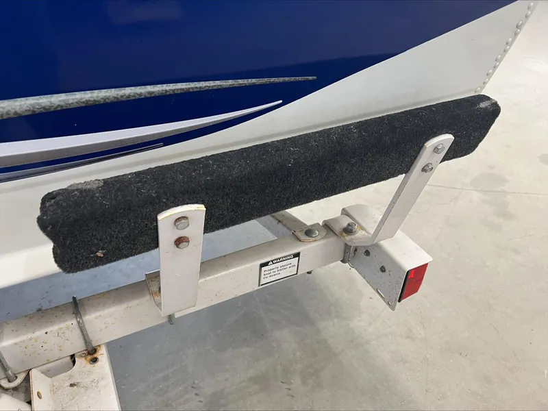 Slide: The Image of Trailer detail of a 2005 Starcraft Wb 16 D-Star boat. - 13