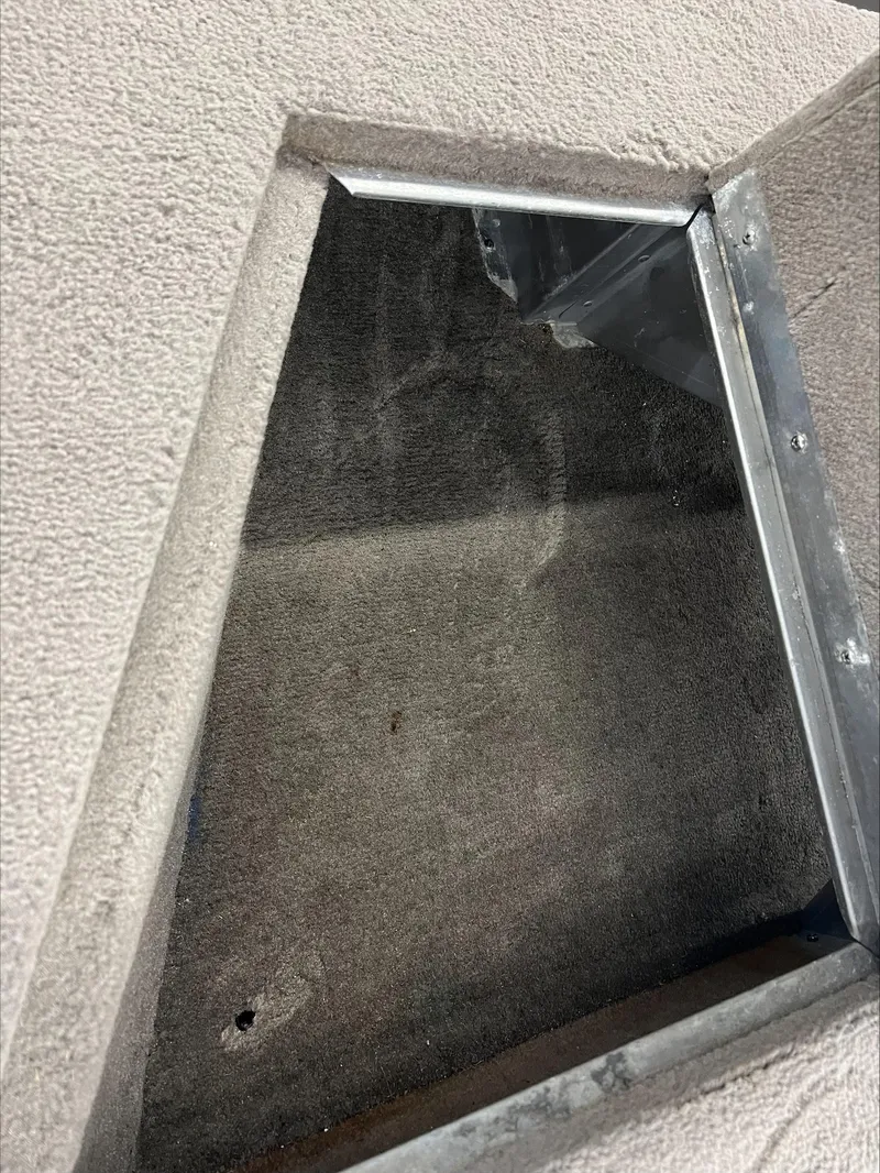 Slide: The Image of 2005 Starcraft Wb 16 D-Star interior compartment with metal frame and carpeted surface. - 6