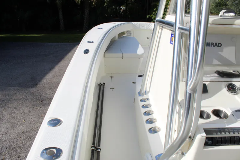 Slide: The Image of 2016 SeaVee 340Z boat interior with rod holders and Simrad electronics. - 12