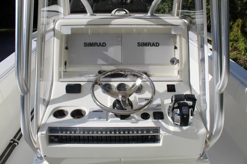 Slide: The Image of 2016 SeaVee 340Z boat console with Simrad electronics and steering wheel. - 13