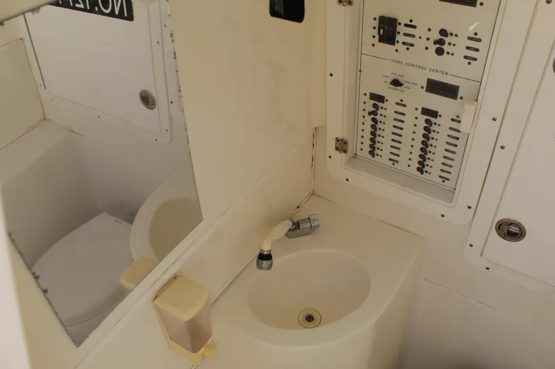 Slide: The Image of 2016 SeaVee 340Z boat interior with sink and control panel. - 19