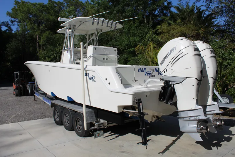 Slide: The Image of 2016 SeaVee 340Z boat with twin Mercury engines on a trailer. - 3