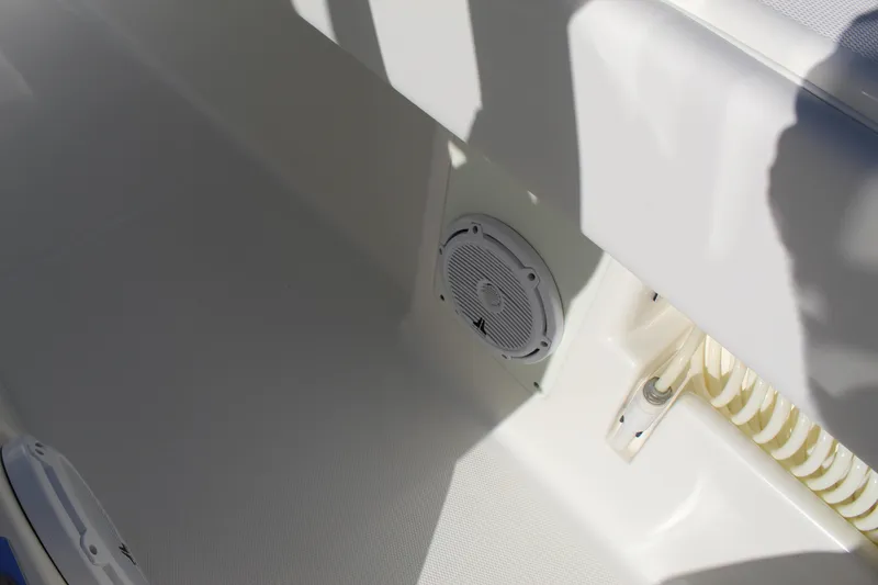 Slide: The Image of 2016 SeaVee 340Z boat interior with speaker and coiled rope. - 37