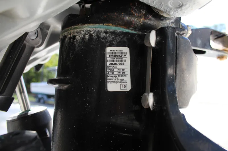 Slide: The Image of Close-up of a 2016 SeaVee 340Z engine component with a Mercury Marine label. - 44