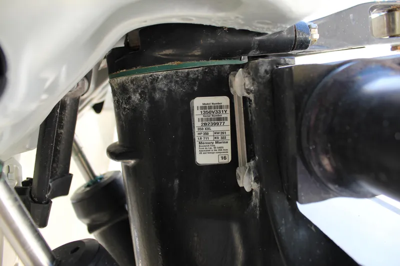 Slide: The Image of Close-up of a 2016 SeaVee 340Z engine component with a visible label. - 45