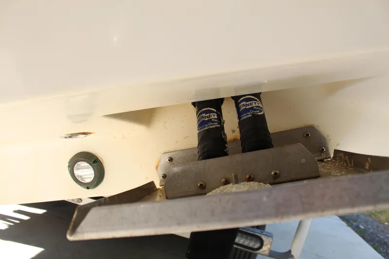 Slide: The Image of 2016 SeaVee 340Z boat hull detail with underwater fittings and trim tabs. - 7