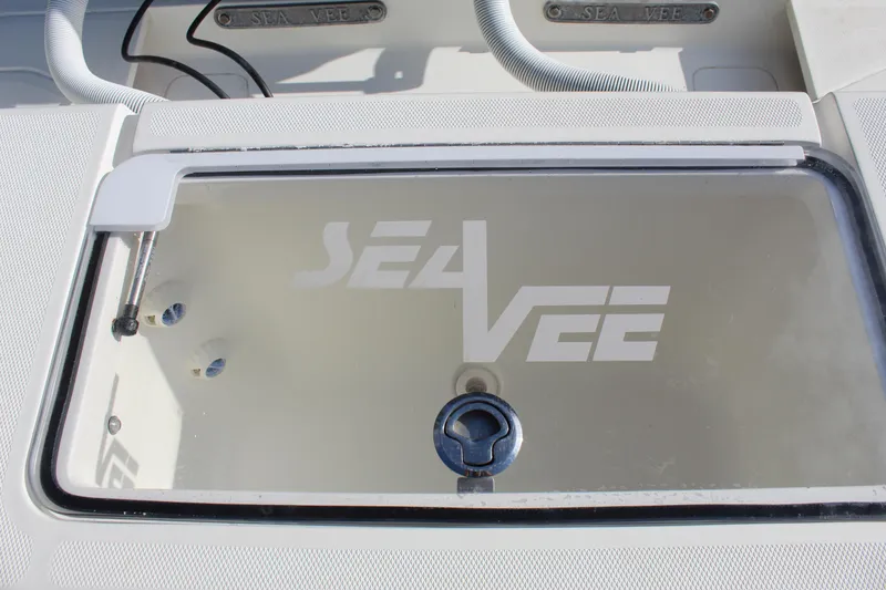 Slide: The Image of 2016 SeaVee 340Z livewell with logo, featuring sleek design and modern fittings. - 9