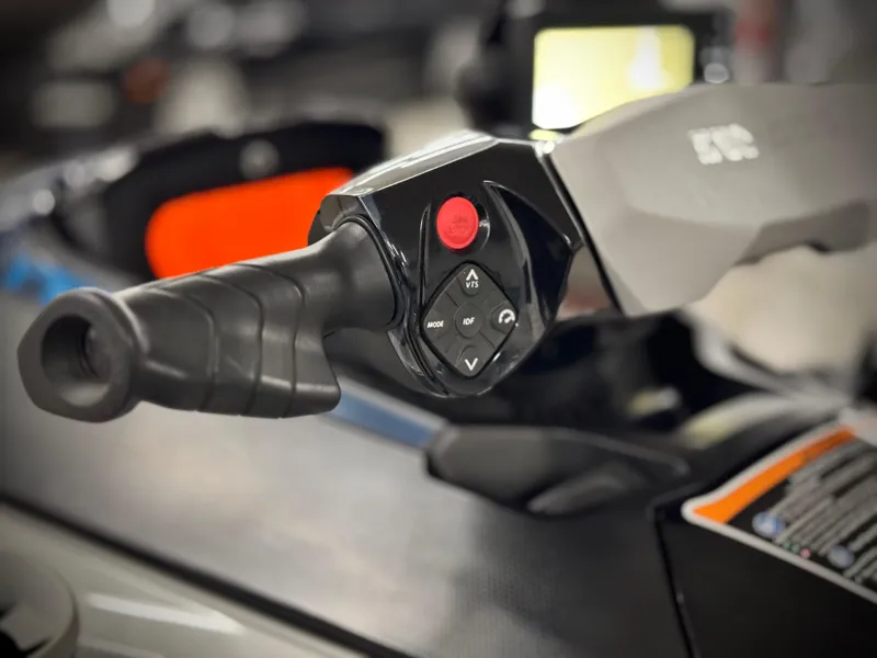 Slide: The Image of 2023 Sea-Doo Fishpro Sport 170 handlebar controls, featuring ergonomic design and intuitive buttons. - 11