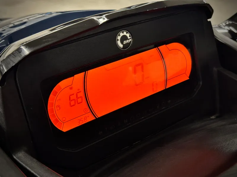 Slide: The Image of 2023 Sea-Doo Fishpro Sport 170 dashboard with illuminated orange display. - 13