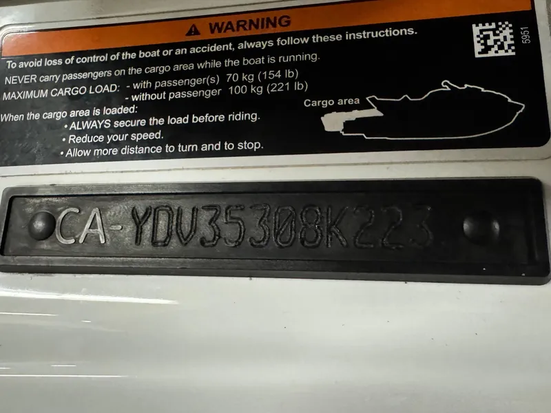 Slide: The Image of 2023 Sea-Doo Fishpro Sport 170 warning label and serial number plate. - 17