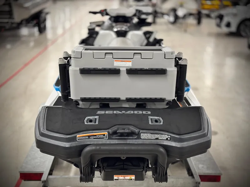 Slide: The Image of 2023 Sea-Doo Fishpro Sport 170, rear view with storage box, in a showroom. - 5