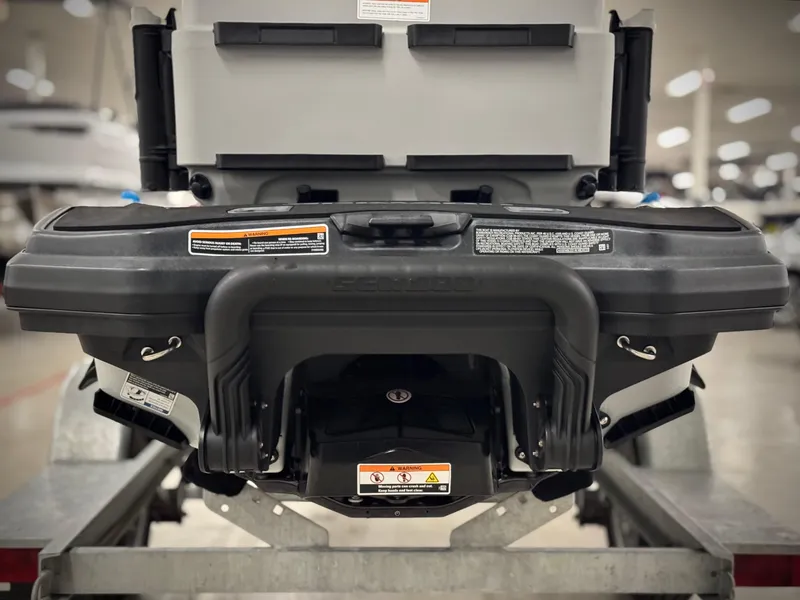 Slide: The Image of 2023 Sea-Doo Fishpro Sport 170 rear view on trailer in showroom. - 6