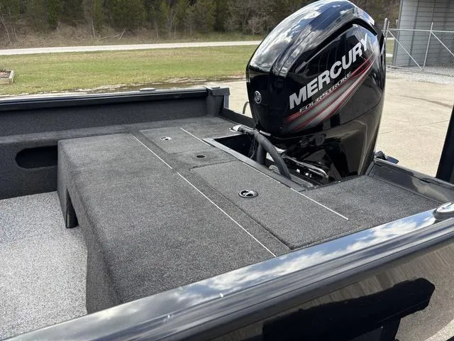 Slide: The Image of Ranger VS1680 boat with Mercury engine, 2016 model, parked outdoors. - 8