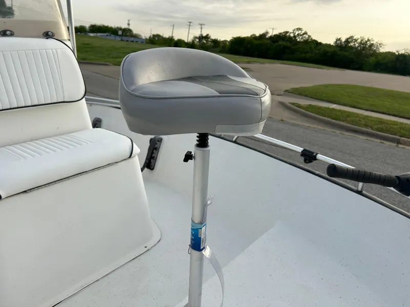 Slide: The Image of 2006 Carolina Skiff SEA CHASER boat seat and deck, outdoor setting. - 33