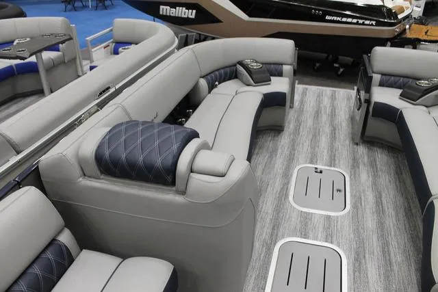 Slide: The Image of 2025 Bennington RX Sport Swingback 25 RXSB interior with luxurious seating and modern design. - 3