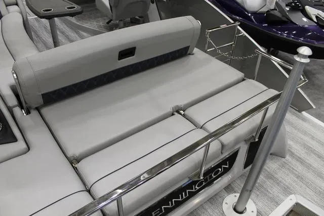 Slide: The Image of 2025 Bennington RX Sport Swingback 25 RXSB boat interior with sleek seating and modern design. - 5