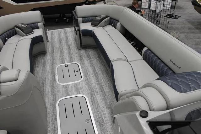 Slide: The Image of 2025 Bennington RX Sport Swingback 25 RXSB interior with luxurious seating and modern design. - 7