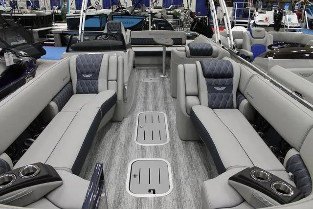 Slide: The Image of 2025 Bennington RX Sport Swingback 25 RXSB interior with luxurious seating and modern design. - 8