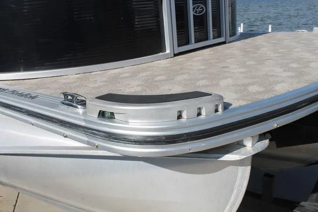 Slide: The Image of 2011 Harris 250 SL Grand Mariner pontoon boat, close-up of deck and railing. - 24