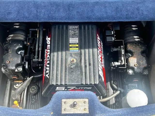 Slide: The Image of Engine compartment of a 2000 Sea Ray 210 Signature Bowrider with Mercury 5.7L motor. - 25