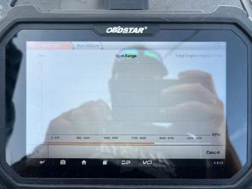 Slide: The Image of 2022 Lowe Legacy boat with Mercury 90 engine, parked in a lot. - 2